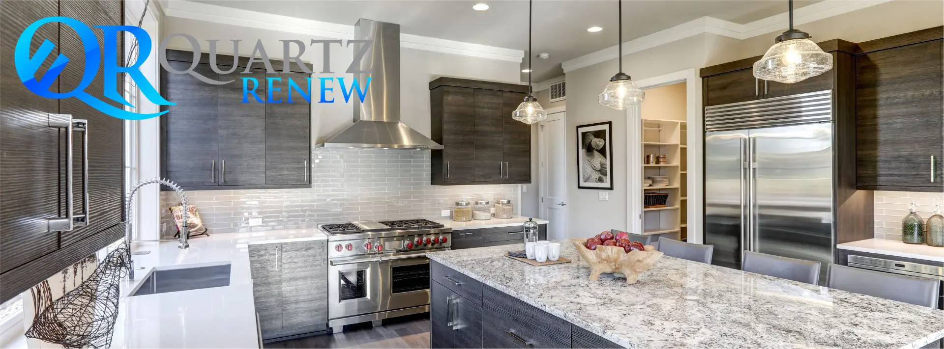 Modern kitchen with stainless steel appliances.