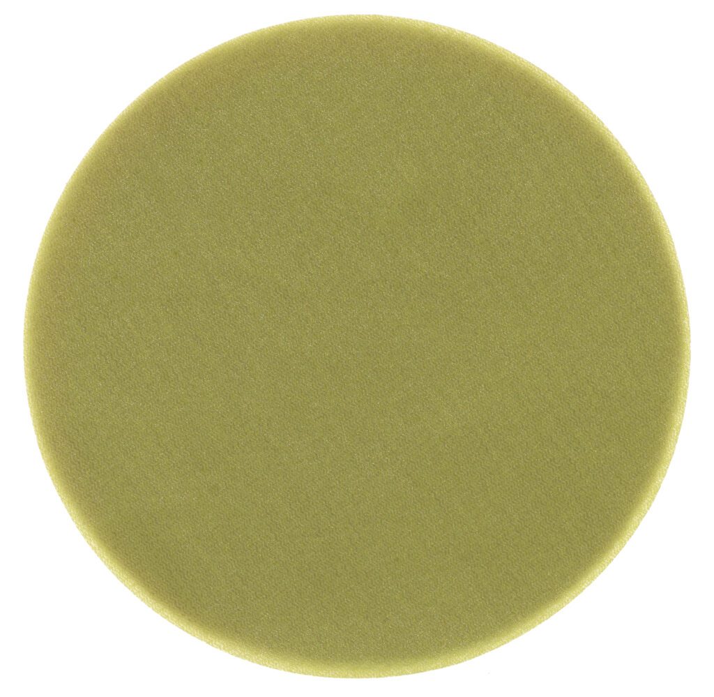 Here's an alt tag for the image: Olive green polishing pad.